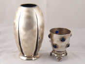 Appraisal: A WMF silver plate Ikora bomb vase with swirl finished