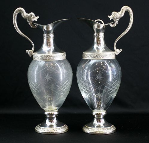 Appraisal: A pair of Italian silver plated and cut glass decanters