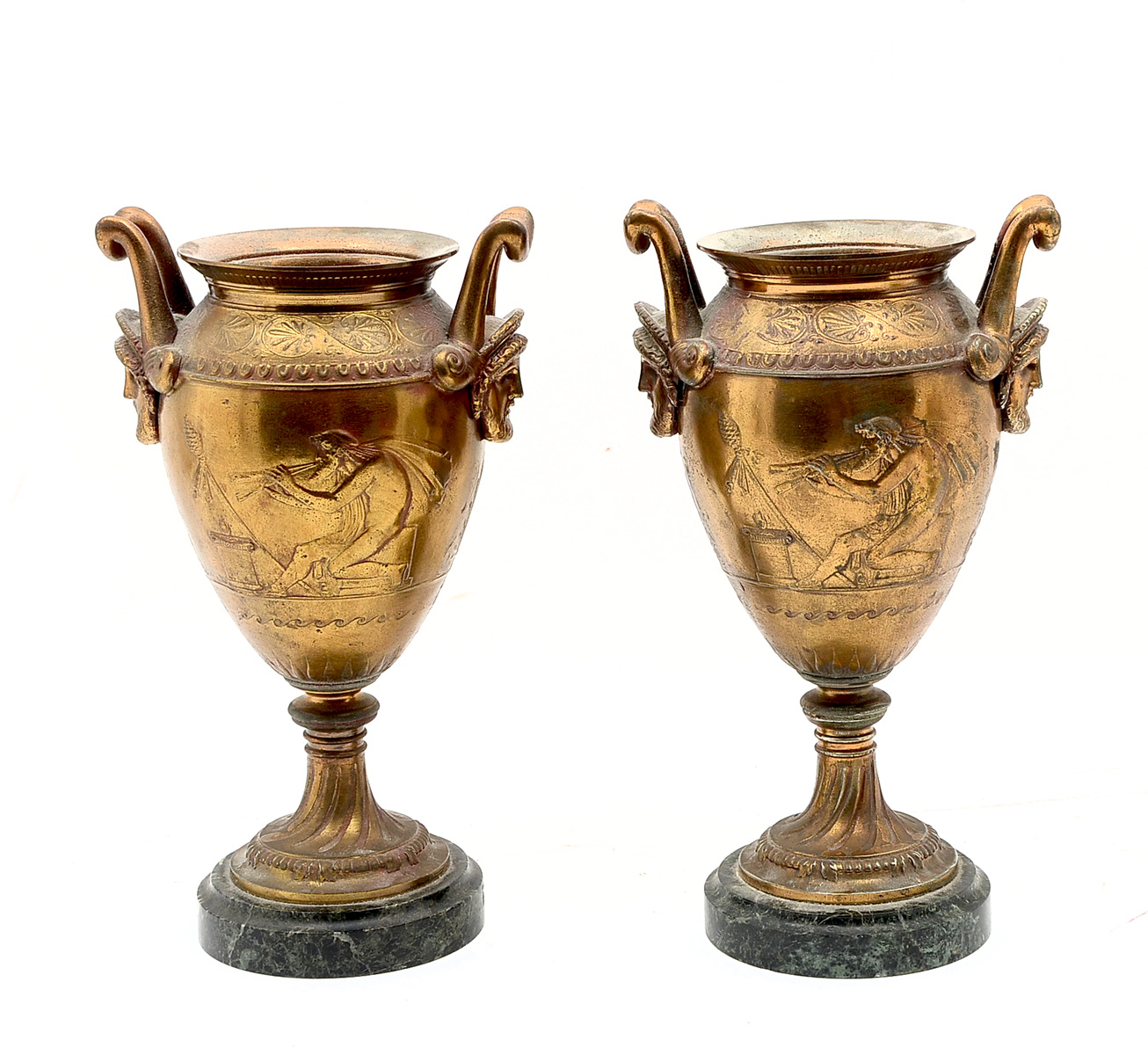 Appraisal: PAIR OF BRASS URNS W MASQUERONS Old white brass urns