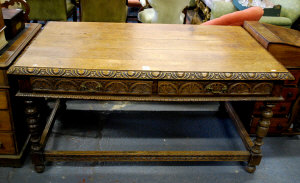 Appraisal: A Jacobean style carved oak centre table with two frieze