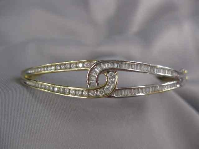 Appraisal: Diamond Bangle Bracelet round and baguette diamonds totaling carat in