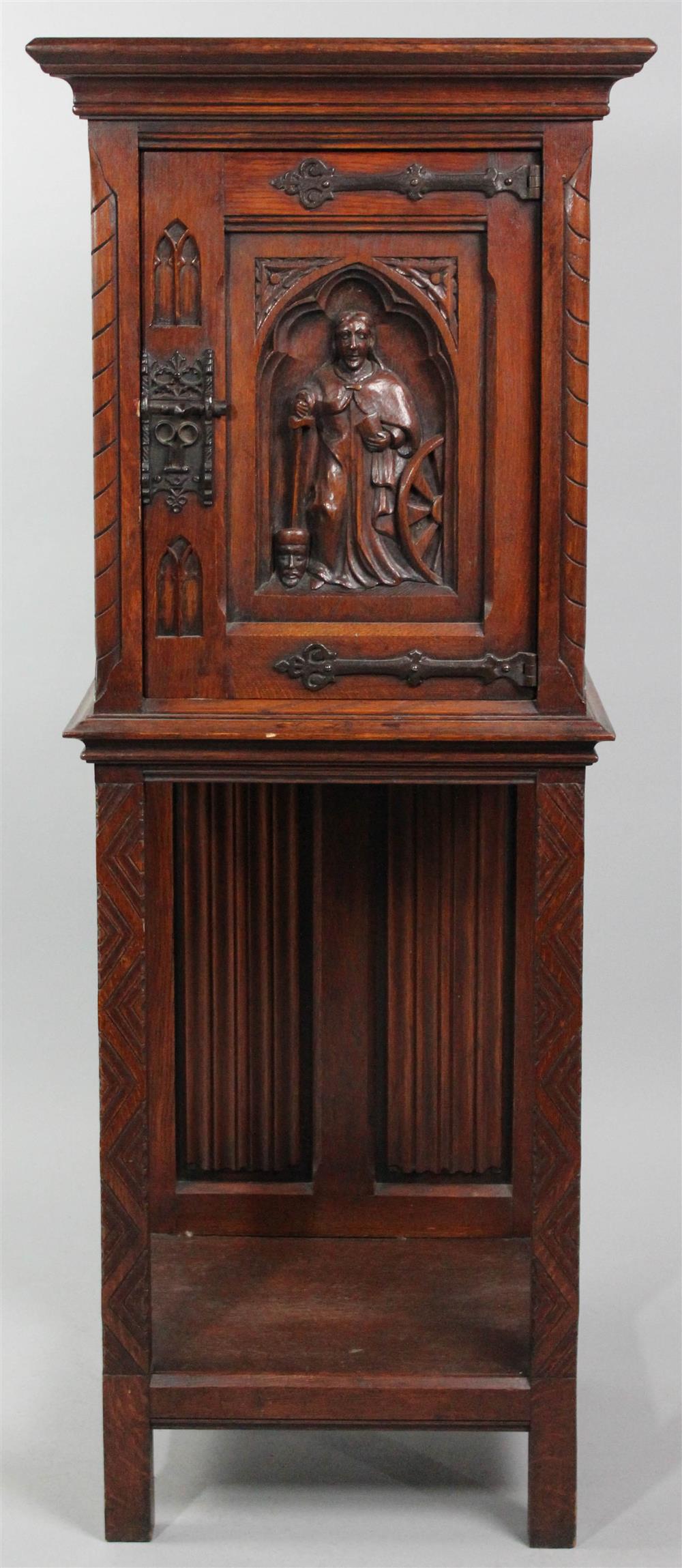 Appraisal: GOTHIC STYLE OAK CABINET early th Century carved with a