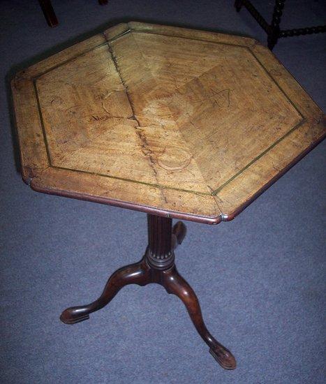 Appraisal: A Regency mahogany hexagonal table the top with brass stringing