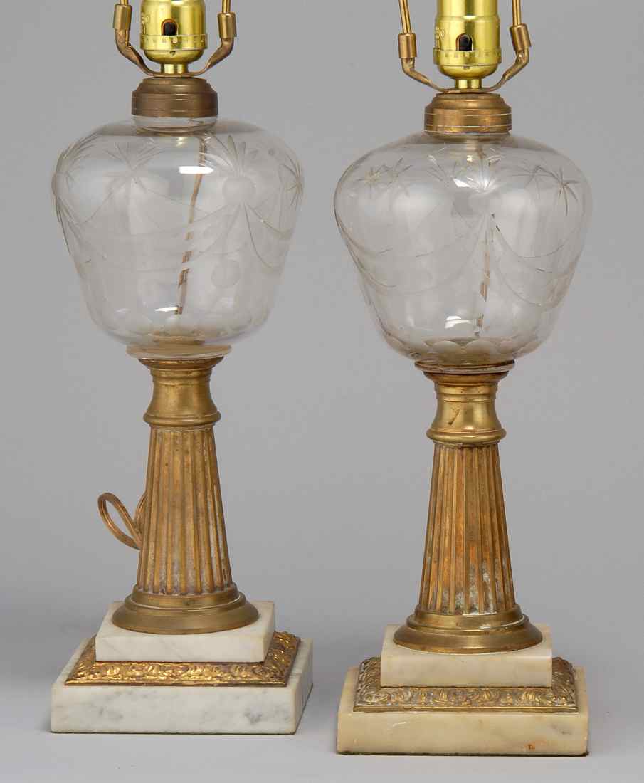 Appraisal: PAIR OF SANDWICH CLEAR GLASS LAMPS th CenturyWith clear blown