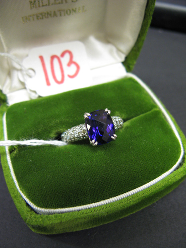 Appraisal: AMETHYST DIAMOND AND EIGHTEEN KARAT WHITE GOLD RING centering a