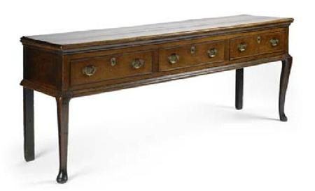 Appraisal: A George III oak dresser base the rectangular planked top