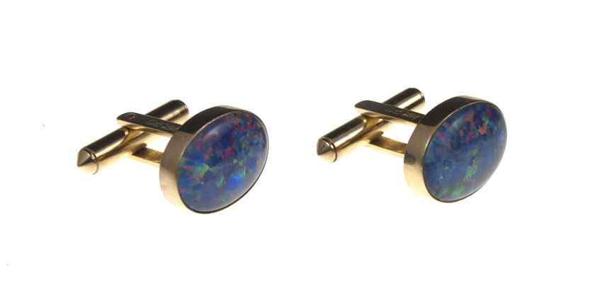 Appraisal: K OPAL CUFFLINKS K yellow gold cufflinks with x mm