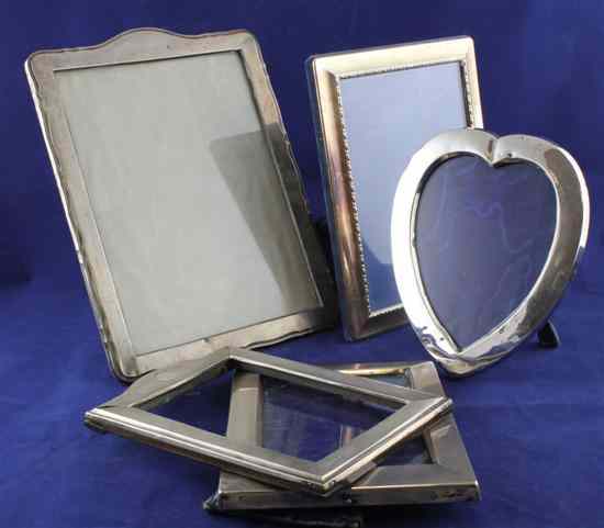 Appraisal: A late Victorian engine turned silver photograph frame with domed