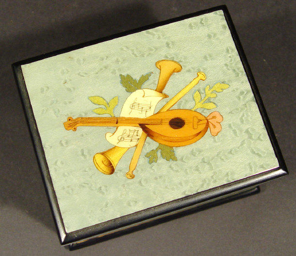 Appraisal: Swiss wooden music box the lid inlaid with musical instruments