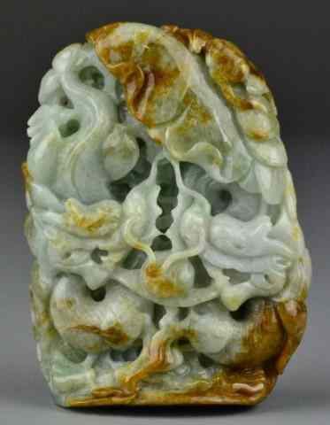 Appraisal: Chinese Carved Jade BoulderFinely carved to depict two dragons chasing