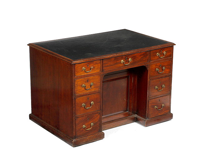 Appraisal: A GEORGE III MAHOGANY PARTNERS DESK with leather inset top