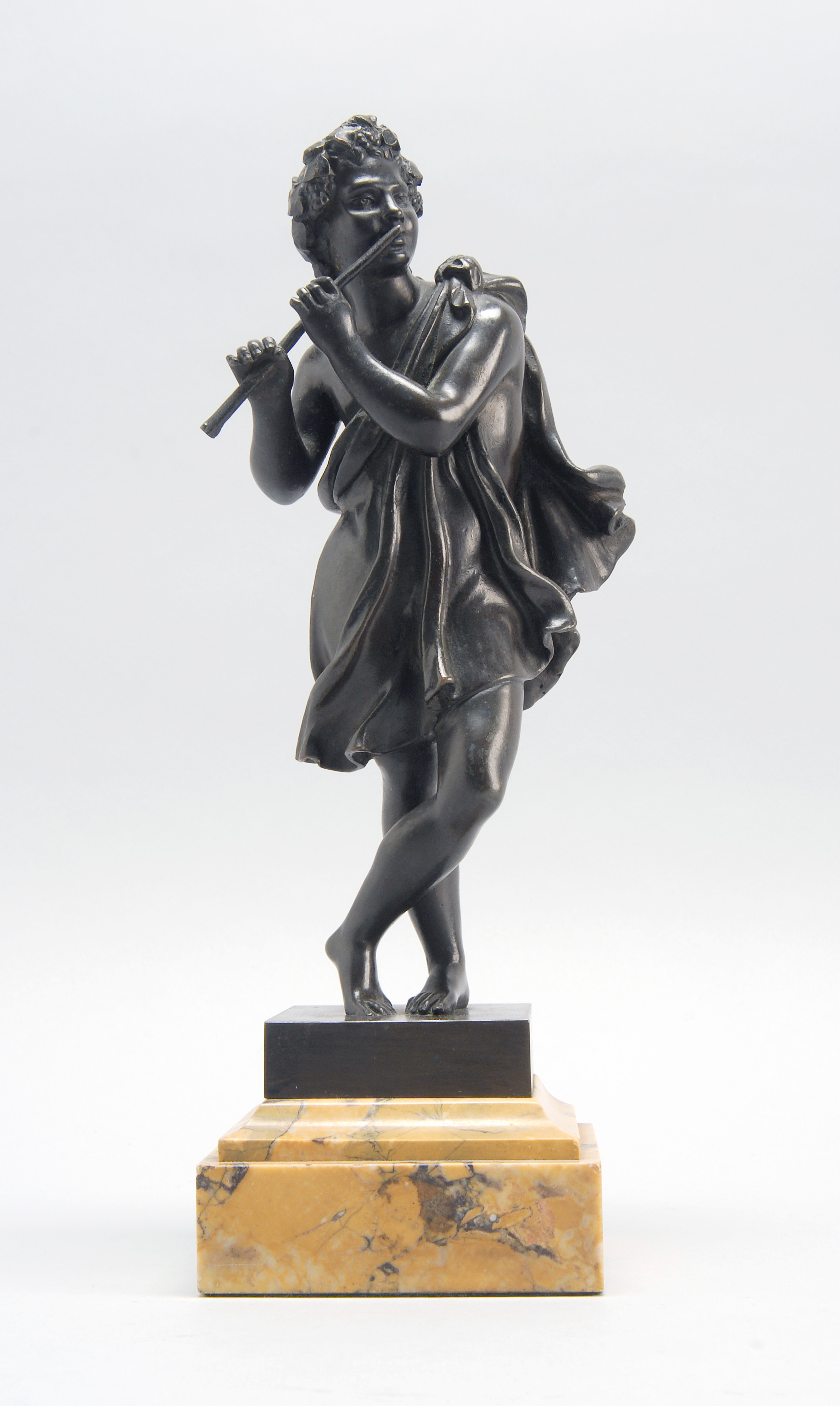 Appraisal: BRONZE FIGURE OF YOUNG MAN PLAYING A FLUTE Early th