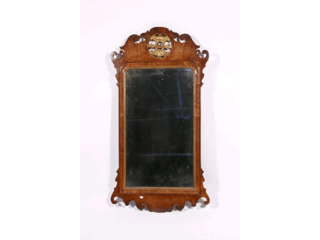 Appraisal: A CHIPPENDALE STYLE WALL MIRROR the rectangular plate with a