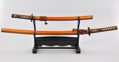 Appraisal: Two Reproduction Japanese Samurai Swords with Stand A - L