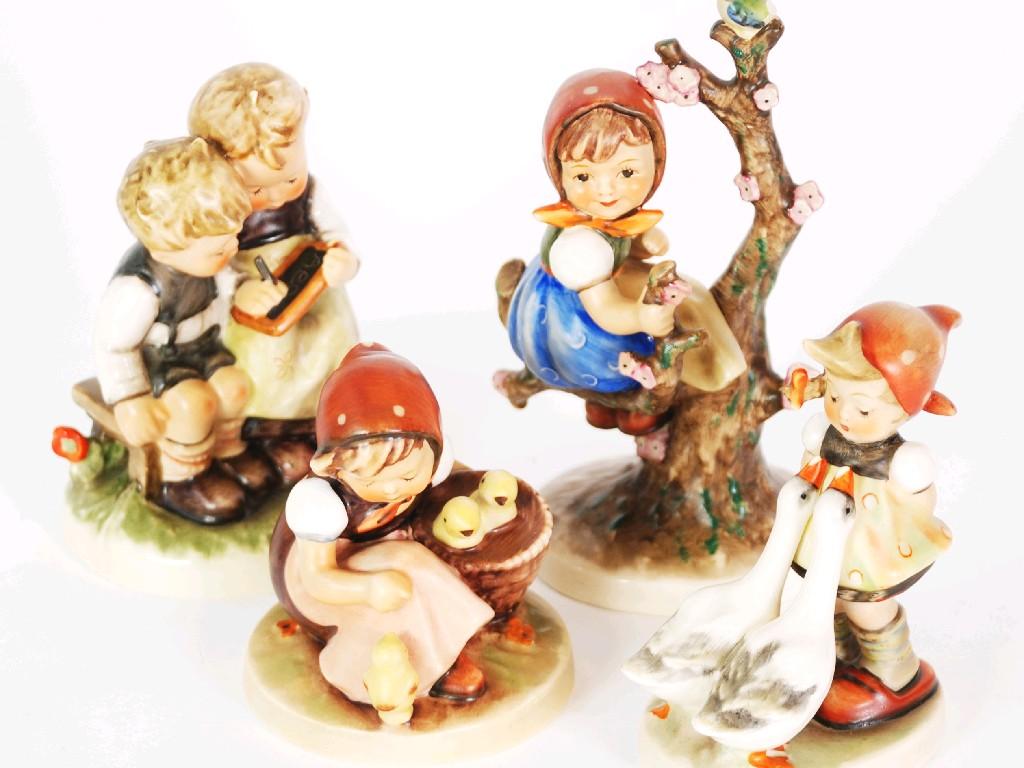 Appraisal: FOUR HUMMEL GOEBEL POTTERY FIGURES 'Smart Little Sister' TMK- cm