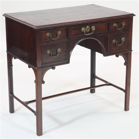 Appraisal: A George III mahogany kneehole desk the crossbanded moulded rectangular