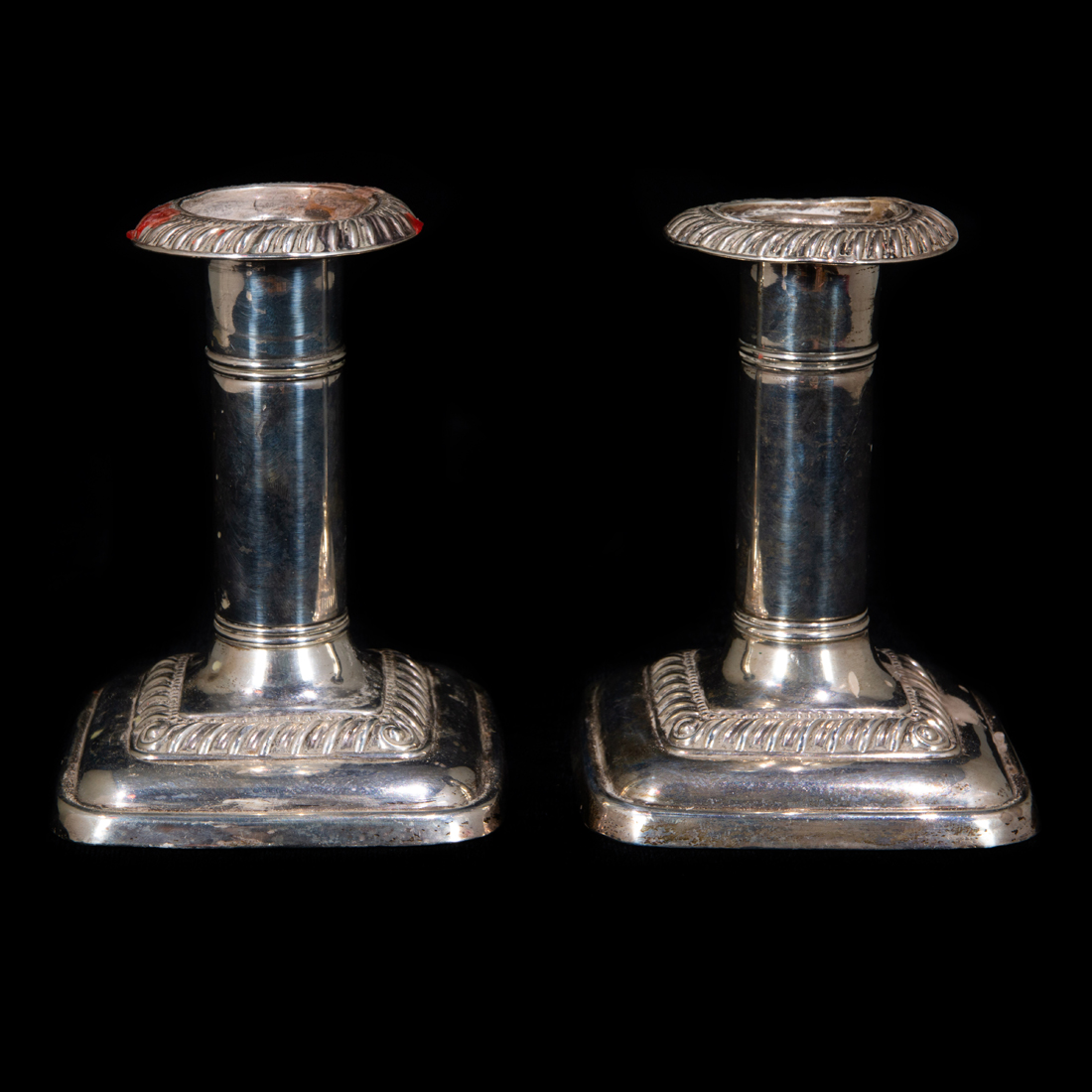 Appraisal: PAIR EDWARDIAN STERLING WEIGHTED CANDLESTICKS Pair Edwardian sterling weighted candlesticks