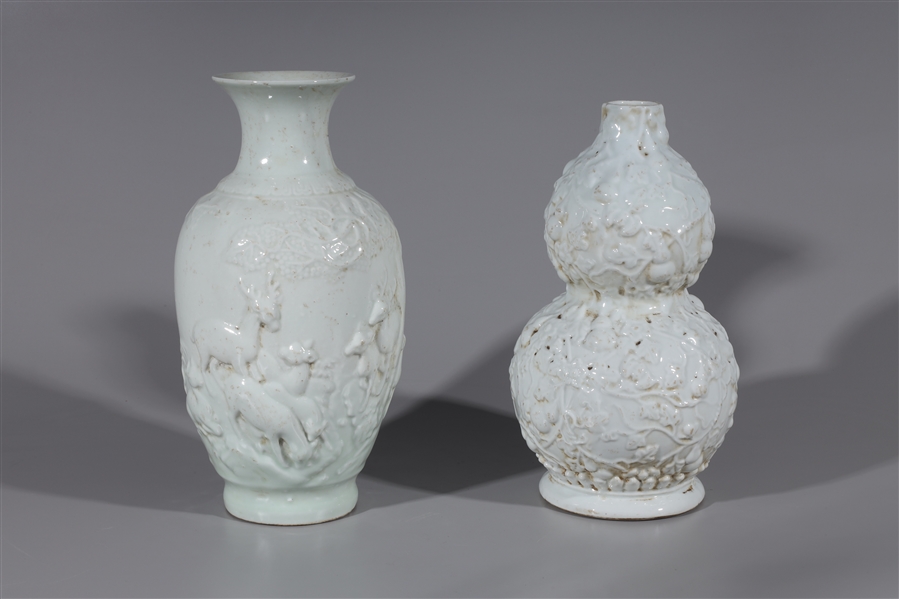 Appraisal: Two eggshell porcelain vases each with raised relief decorations one