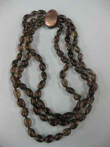 Appraisal: Smokey Quartz Necklace strands on oval polished beads abalone magnetic