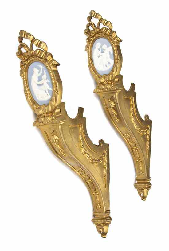 Appraisal: A Pair of Gilt Metal and Jasperware Mounted Curtain Rod