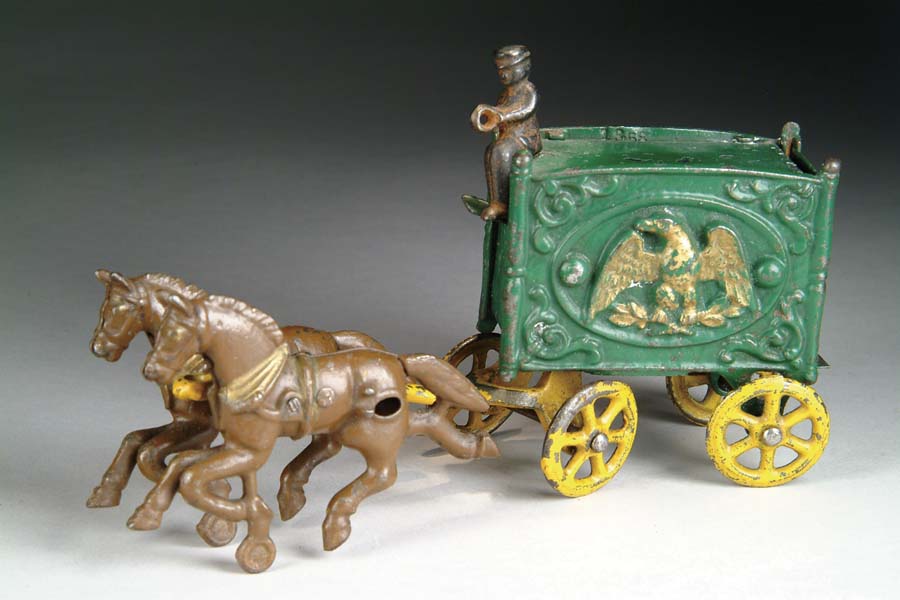 Appraisal: TINY EAGLE HUBLEY CIRCUS WAGON Green wagon with yellow wheels