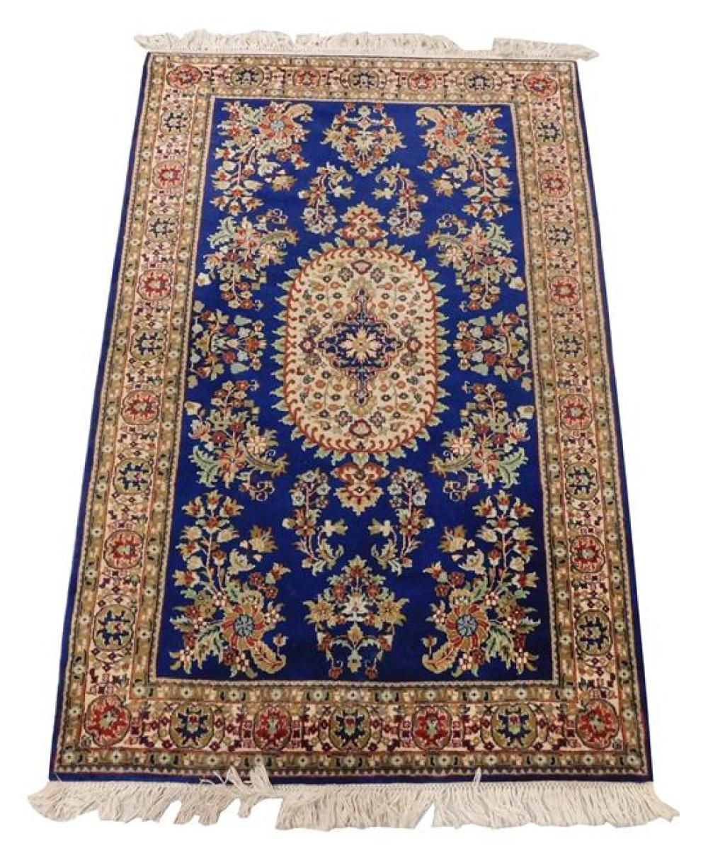 Appraisal: RUG Modern Pesian design scatter rug central medallion on blue