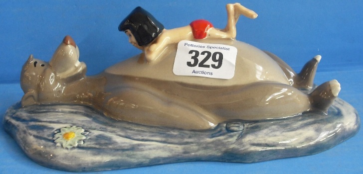 Appraisal: Royal Doulton Disney Tableau Figure Floating Along JB from Jungle