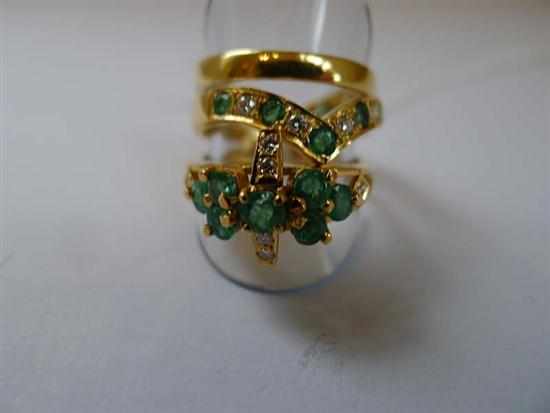 Appraisal: AN EMERALD AND DIAMOND RING SUITE IN CT GOLD