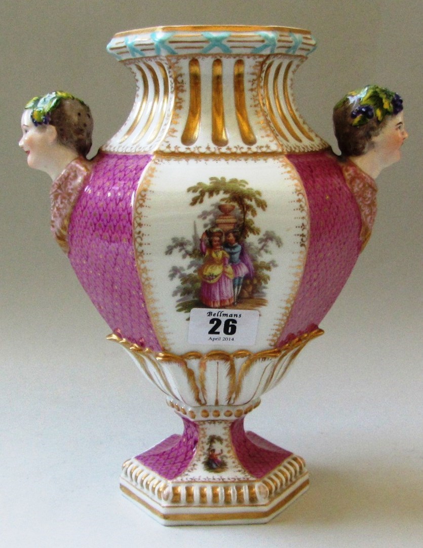 Appraisal: A Dresden porcelain vase with two figural bust handles against