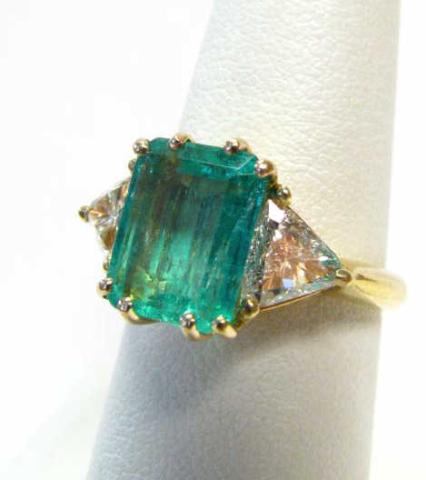 Appraisal: K Yellow gold ring with large princess cut emerald approximately