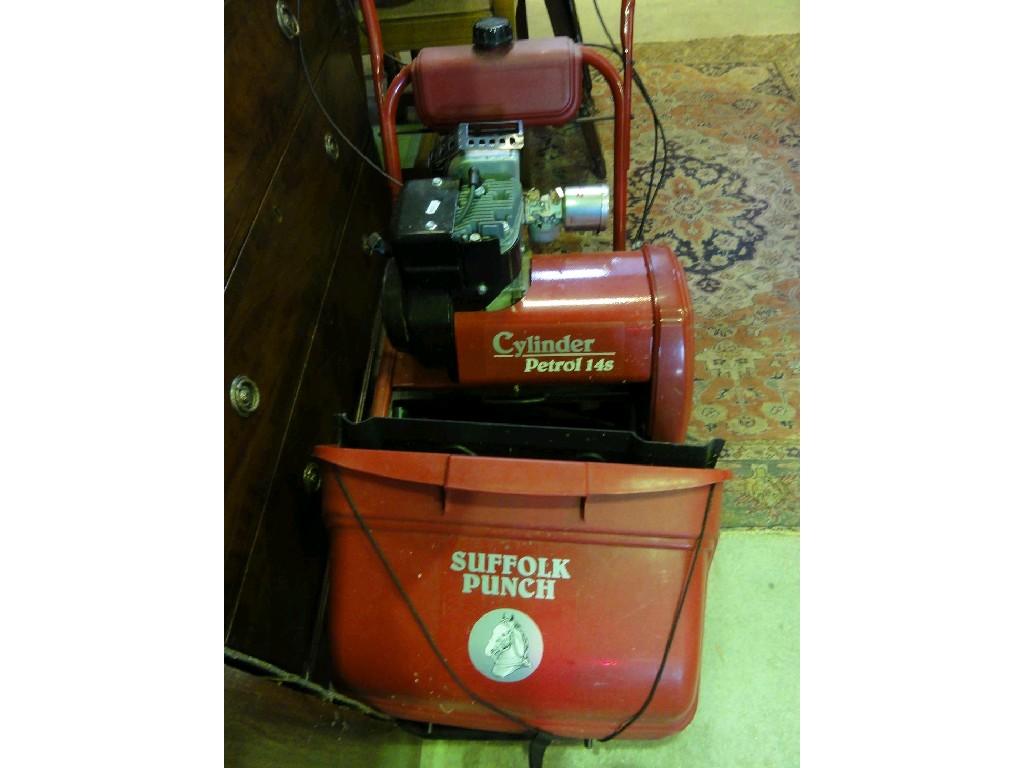 Appraisal: A Suffolk punch cylinder petrol S lawn mower with red