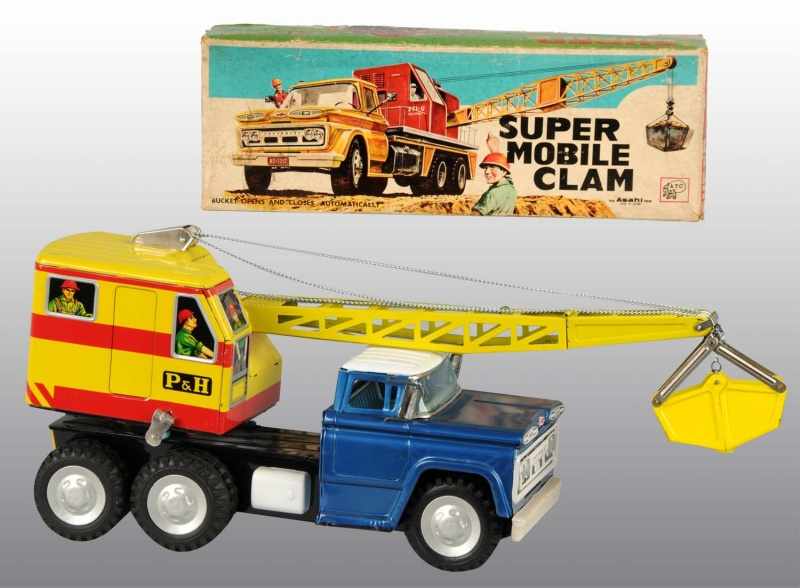 Appraisal: Lot of Tin Construction Vehicle Toys Description Japanese Working Includes