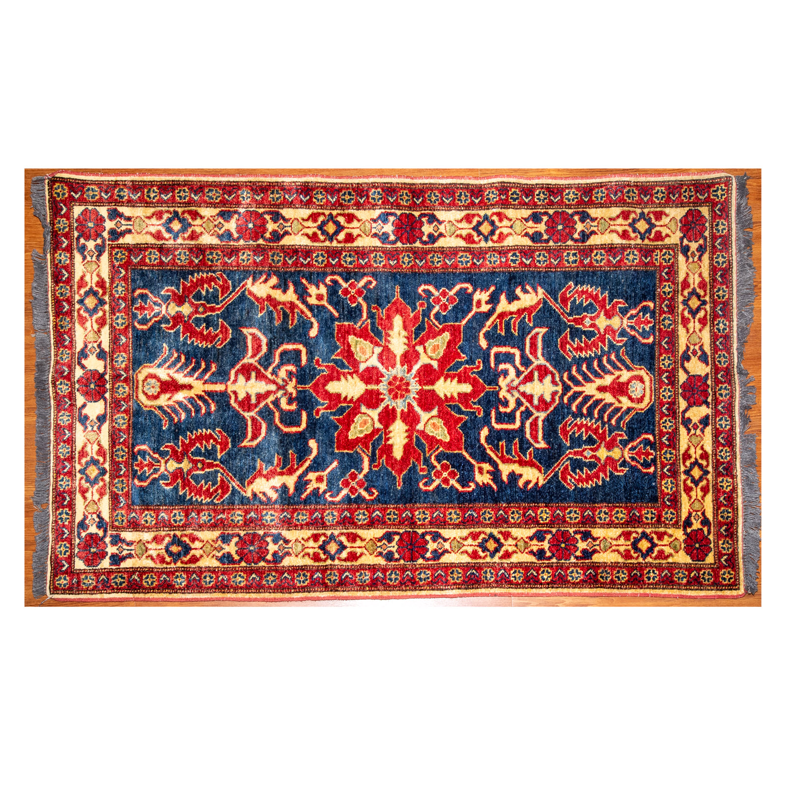 Appraisal: PAK KAZAK RUG PAKISTAN X Modern hand-knotted wool pile on