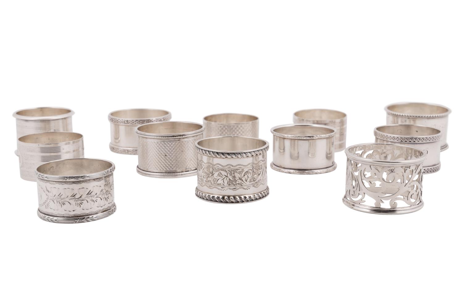 Appraisal: TWELVE STERLING SILVER NAPKIN RINGS Twelve sterling silver napkin rings