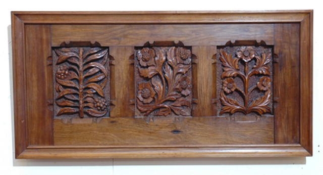 Appraisal: A FINELY CARVED THREE SECTIONAL BLACKWOOD PANEL Attributed to William