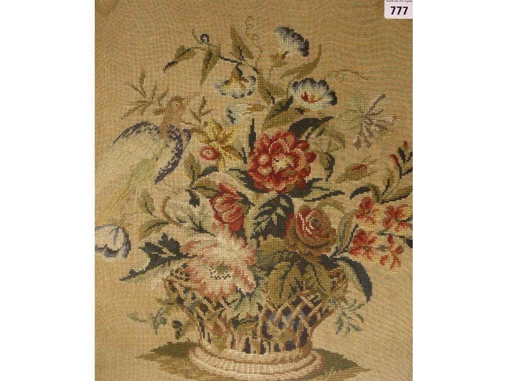 Appraisal: th century woolwork picture depicting a bird and floral display