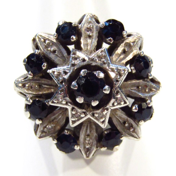 Appraisal: A ladies floral cluster dress ring in a part pierced