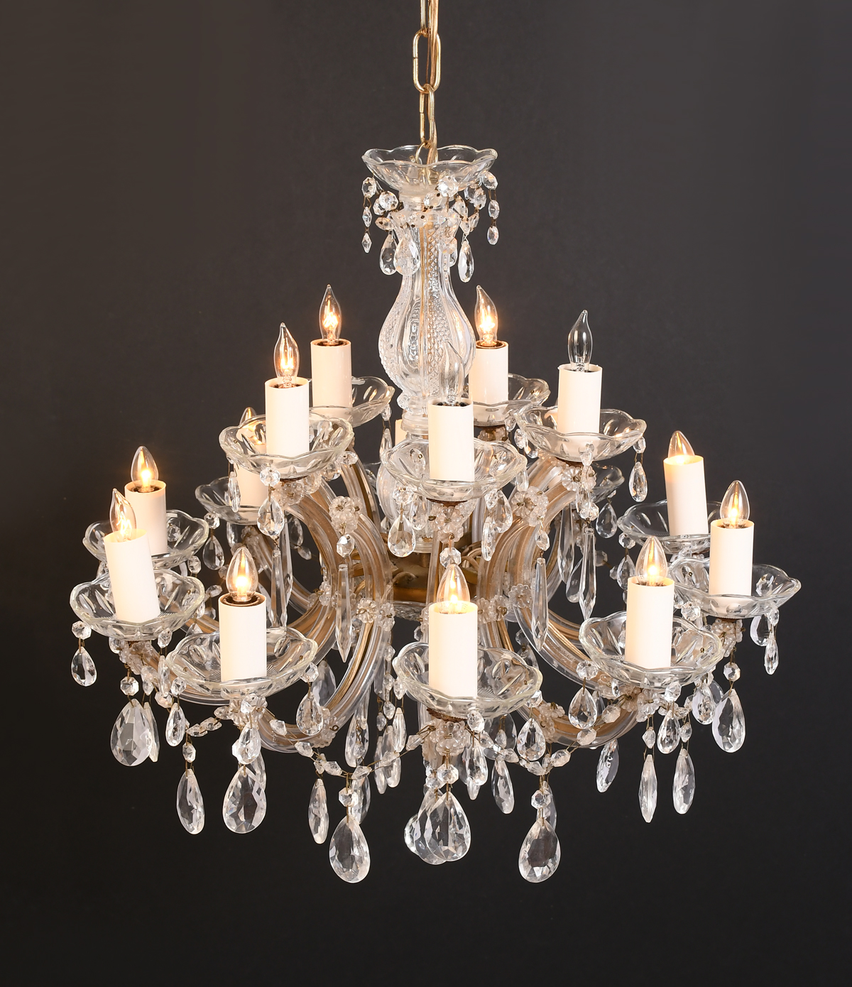 Appraisal: -LIGHT ITALIAN CRYSTAL CHANDELIER Having scrolling arms terminating in crystal