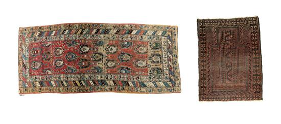 Appraisal: TWO ORIENTAL RUGS Twentieth century Kurdish with animal motifs on