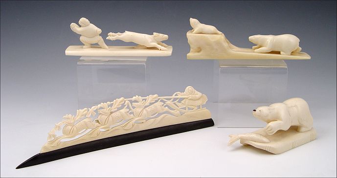 Appraisal: COLLECTION OF RUSSIAN CARVED IVORY FIGURES To include Polar bear