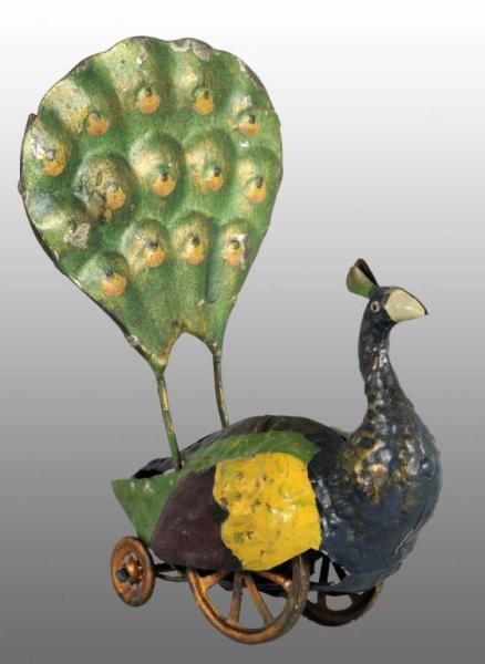 Appraisal: Tin Hand-Painted Peacock Toy Description Probably German Very unusual mechanism