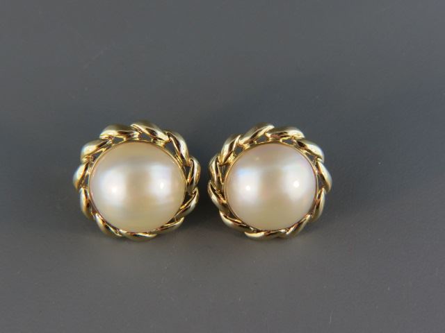 Appraisal: Mabe Pearl Earrings lusterous pearls in k yellow gold clip