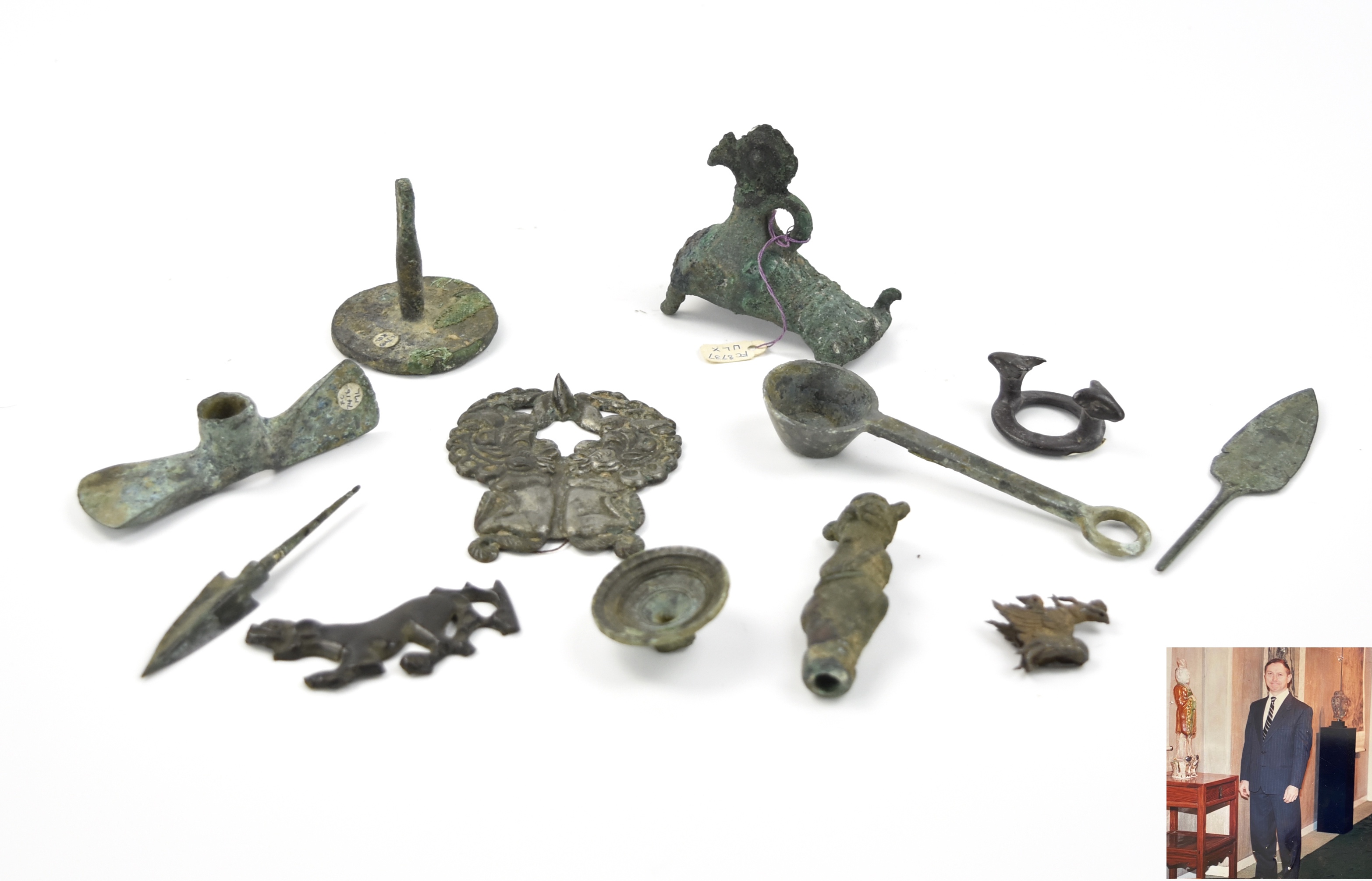 Appraisal: Group of bronze ware consists of scoop cover stamp figures