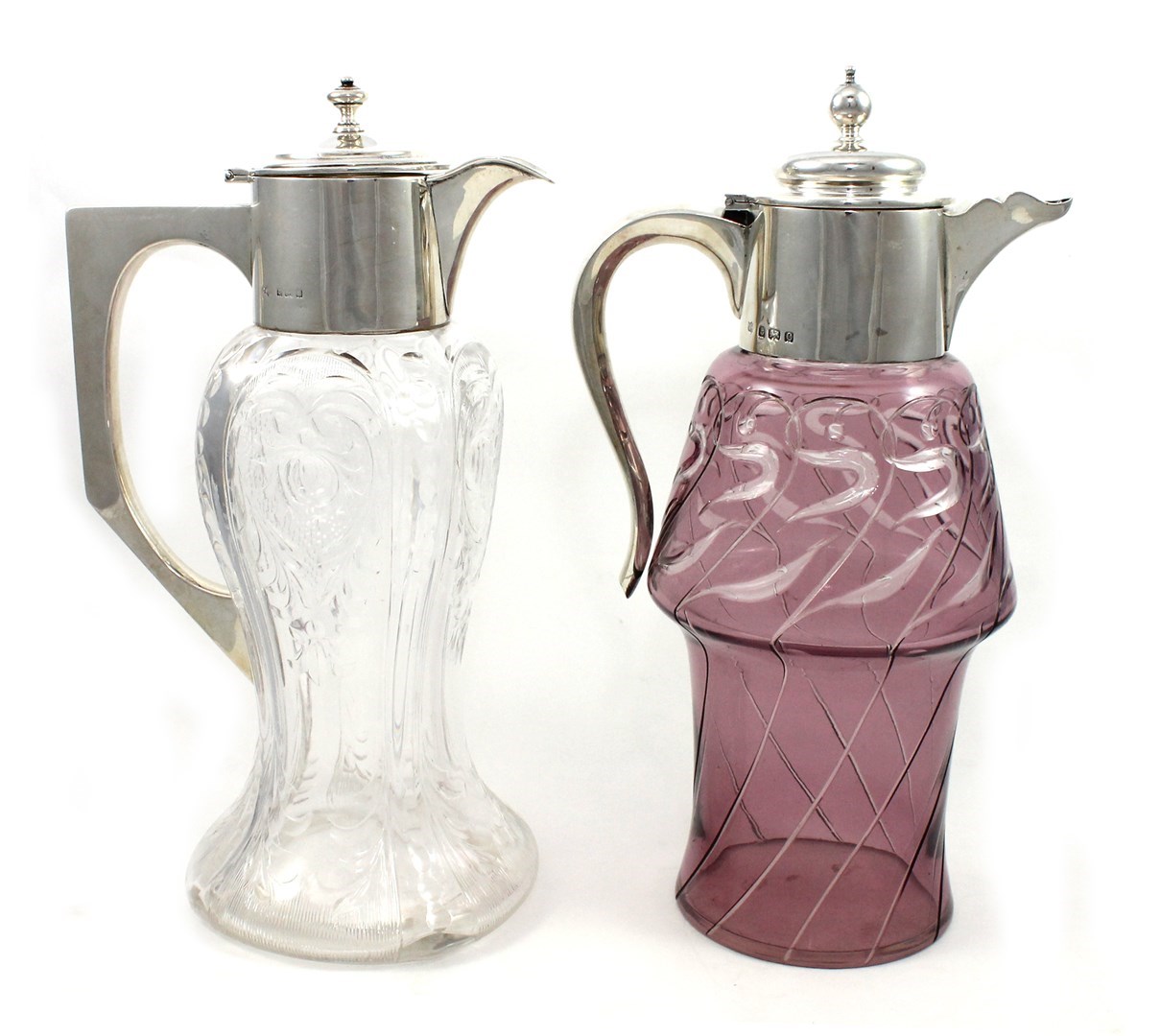 Appraisal: An Edwardian silver mounted amethyst coloured glass claret jug the