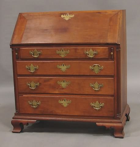 Appraisal: Dove-tailed top fitted interior with prospect door pigeonholes small drawers