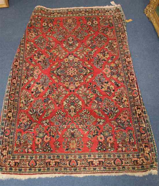 Appraisal: A North West Persian rug with field of foliate motifs