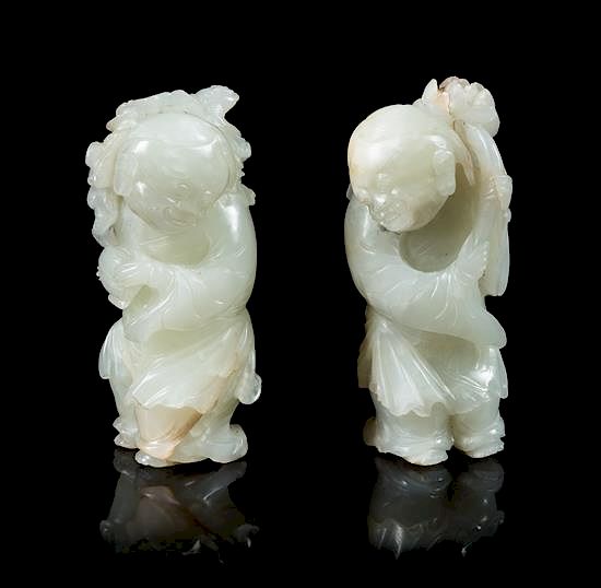 Appraisal: Two Pale Celadon Jade Figures of He He Er Xian