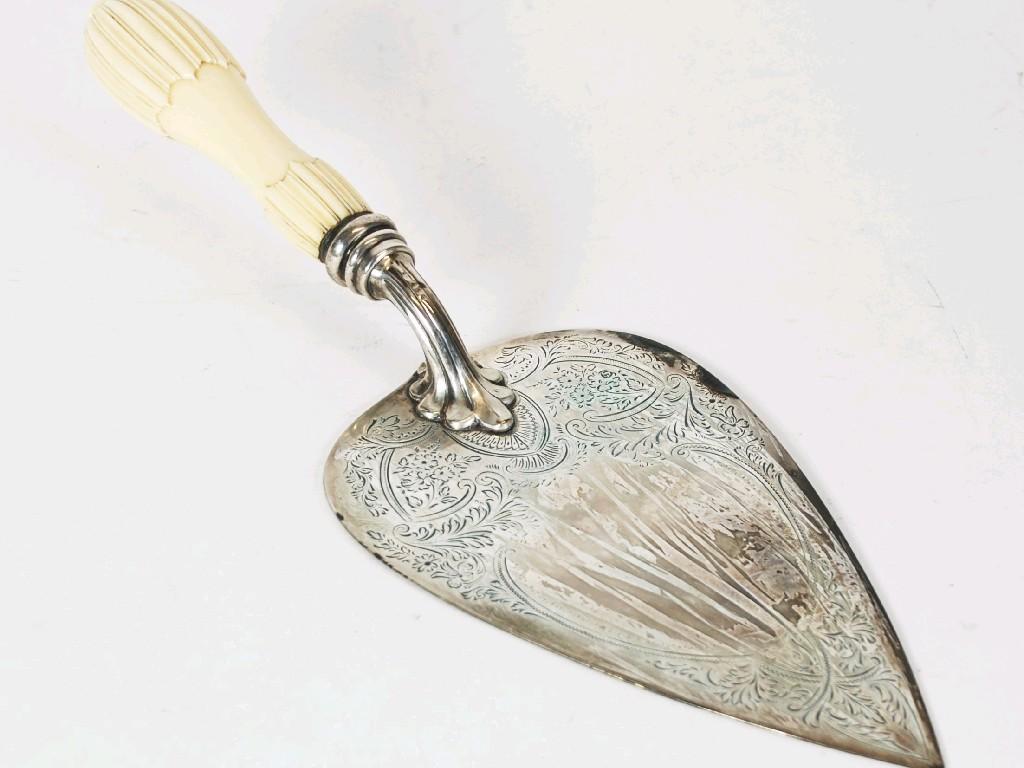 Appraisal: VICTORIAN SILVERED CEREMONIAL TROWEL with floral and foliate scroll engraved