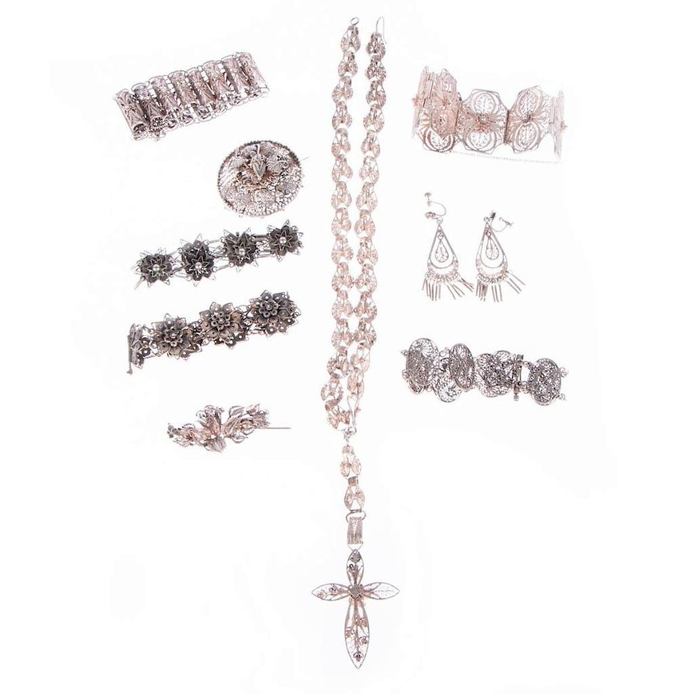 Appraisal: Collection of silver wirework jewelry comprising bracelets necklace brooches and