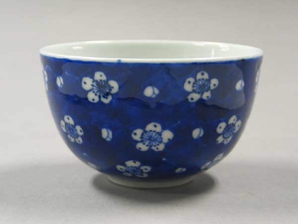 Appraisal: A blue and white porcelain cup With slightly flaring sides